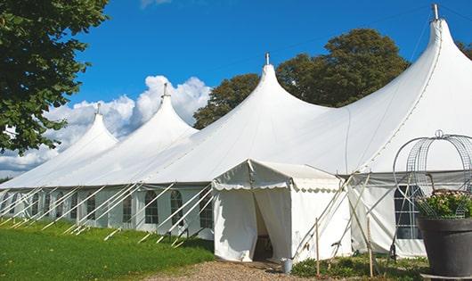 a line of sleek and modern portable toilets ready for use at an upscale corporate event in Chillum